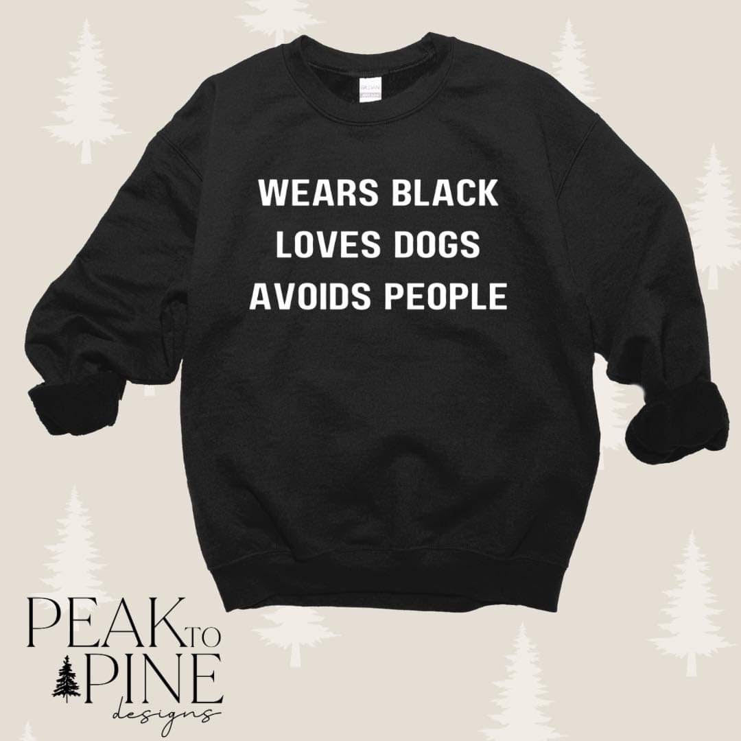Wears black, Loves dogs, Avoids people.